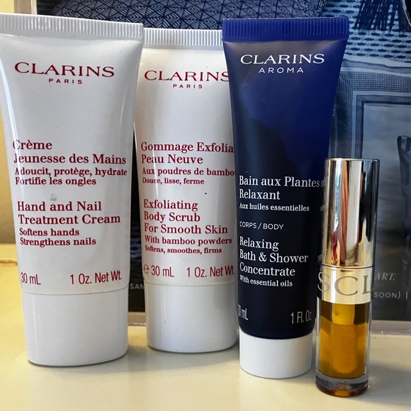 Clarins Travel Set Lip Oil Relax Shower Gel Hand Cream Body Scub ALL NEW - Picture 1 of 1